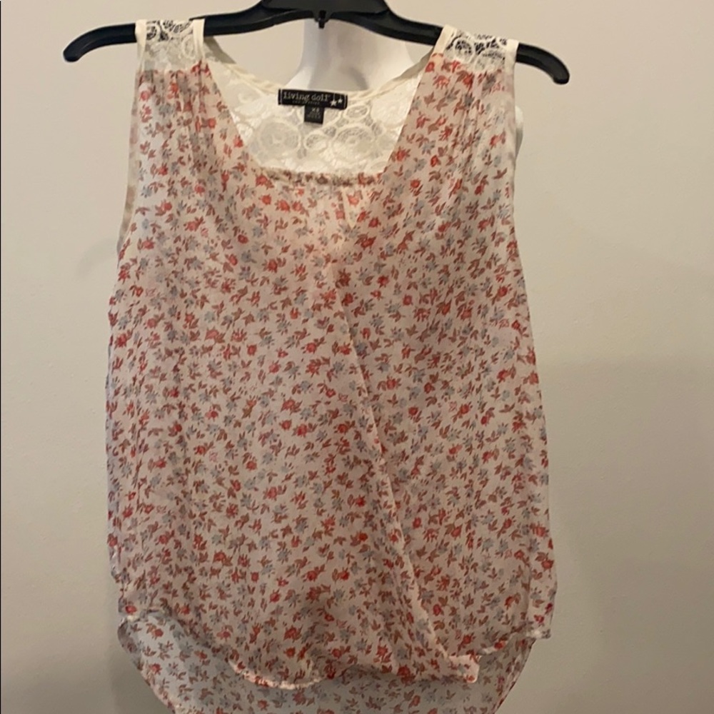 Floral patterned surplice top with lace accents